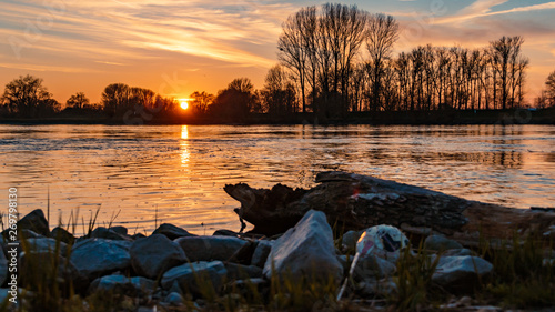 Beautiful sunset with reflections near Osterhofen - Danube  - Bavaria - Germany photo