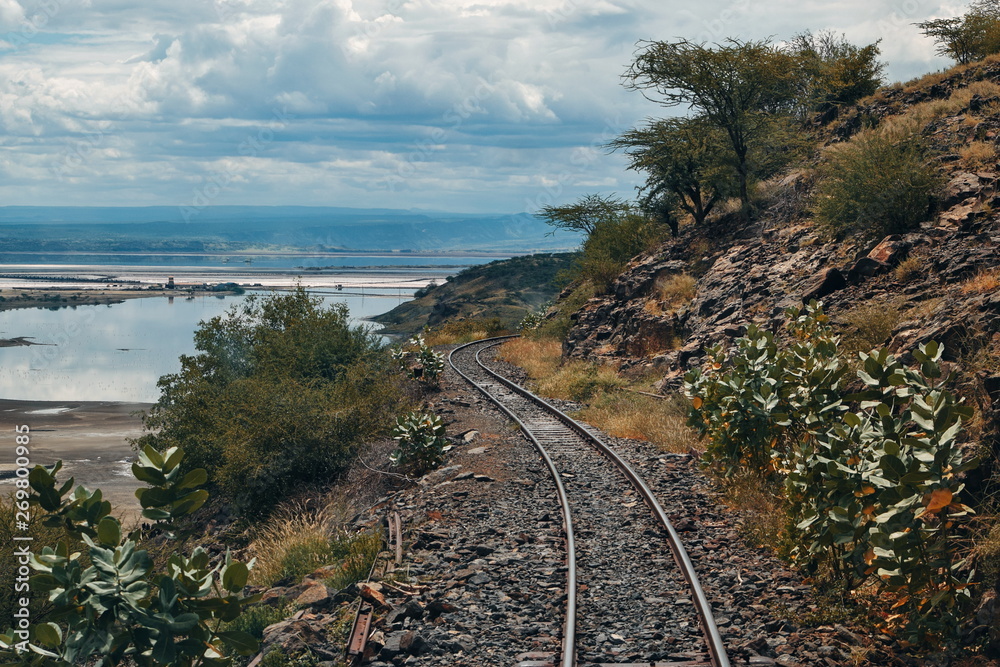 Railway line against a lake background, Lake Magadi, Kenya