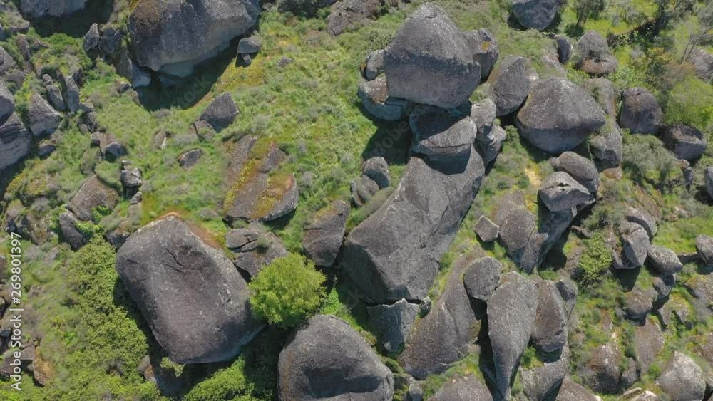 Aerial Flying Above Big Rock Boulders In Mountain, Monsanto village in central Portugal Aerial Flying Above Big Rock Boulders In Mountain, Monsanto village in central Portugal
