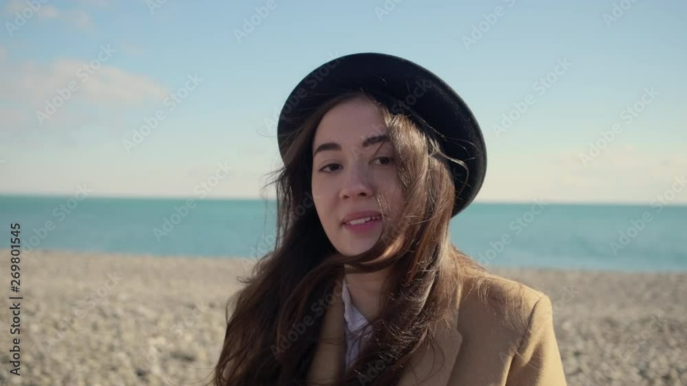 Attractive teen girl on a beach. Attractive teen girl on a beach.