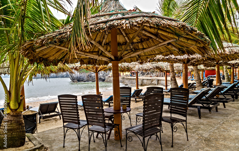 Sandy island Beach chairs on the tropical sand beach