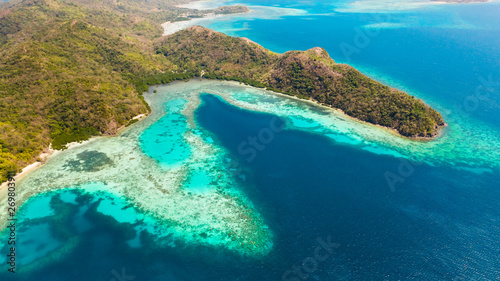 Islands of the Malayan archipelago with turquoise lagoons. Nature of the Philippines, top view. Philippines, Palawan