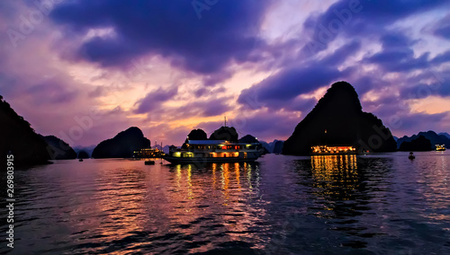 silhouettes of boat sunset sunrise Ha Long Bay Vietnam