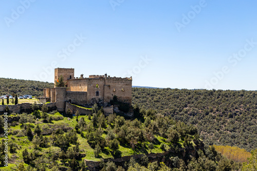 Pedraza, Castilla Y Leon, Spain: view of Pedraza Castle perched on a cliff from Mirador the Tungueras. Pedraza is one of the best preserved medieval villages of Spain