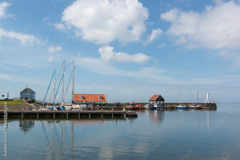 View over the harbor of Hindeloopen, historical city in the lake side district of the Netherlands.