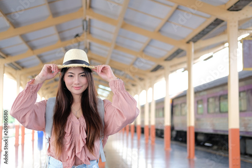 woman  backpacker traveler with backpack at train station. journey trip travel concept © 88studio