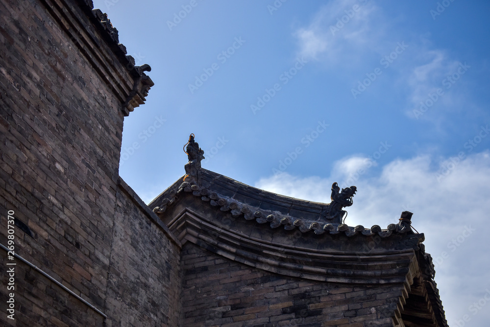Ancient Chinese Architectural Gateway Wall under Clear Sky and White Cloud, Pingyao County, Jinzhong City, Shanxi Province, China Ancient Chinese Architectural Gateway Wall under Clear Sky and White Cloud, Pingyao County, Jinzhong City, Shanxi Province, China