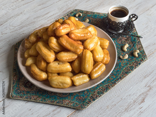 Ramadan sweets are laid out on the table. Top view photo