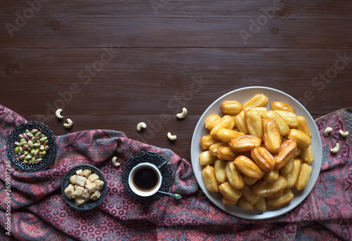 Ramadan sweets are laid out on the table. Top view photo