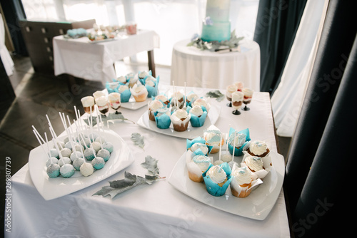 Sweet dessert table at a wedding.Cakestand at a wedding