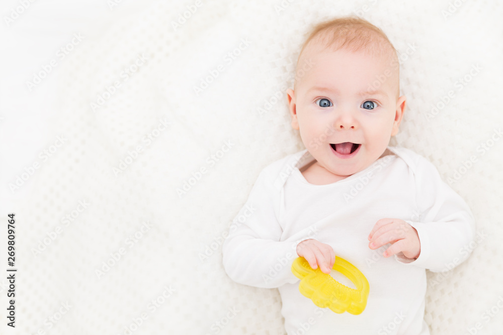 Happy Baby, Cute Infant Kid Playing with Teether Toy, Smiling Boy Portrait, Six Months Old Happy Baby, Cute Infant Kid Playing with Teether Toy, Smiling Boy Portrait, Six Months Old