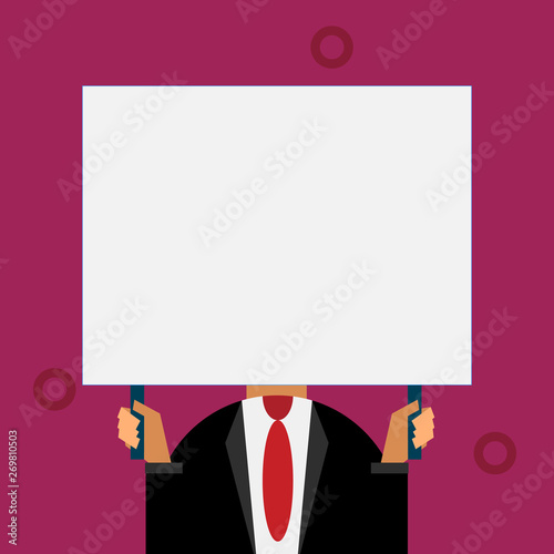 Just man chest dressed dark suit tie no face holding blank big rectangle