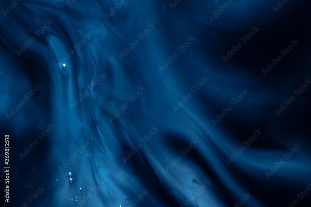 dark abstract texture. blue paint. paint ink stains in water dark abstract texture. blue paint. paint ink stains in water