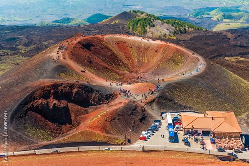 Obraz na płótnie Stunning view at the volcanic crater and groups of tourists walking around it. Mount Etna, Sicily, Italy w salonie