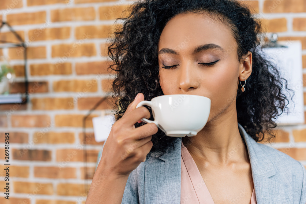 custom made wallpaper toronto digitalafrican american Casual businesswoman drinking coffee in office