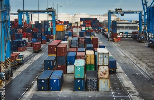 Cargo freight containers at a transhipment hub trade port