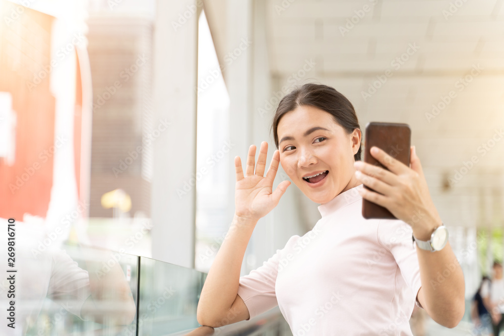 Happy woman using smart phone in the city Happy woman using smart phone in the city