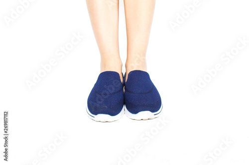 legs in sport shoes on white background