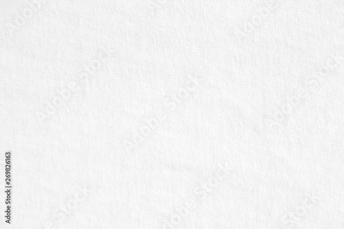 Closeup white crumpled cotton fabric texture background.