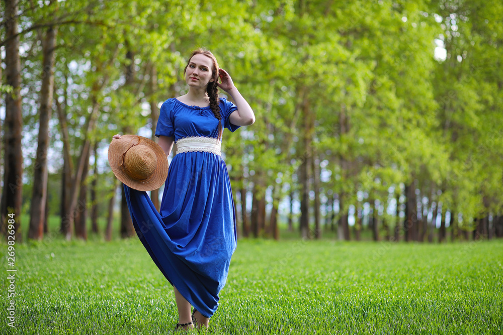 Girl in the countryside in the evening Girl in the countryside in the evening