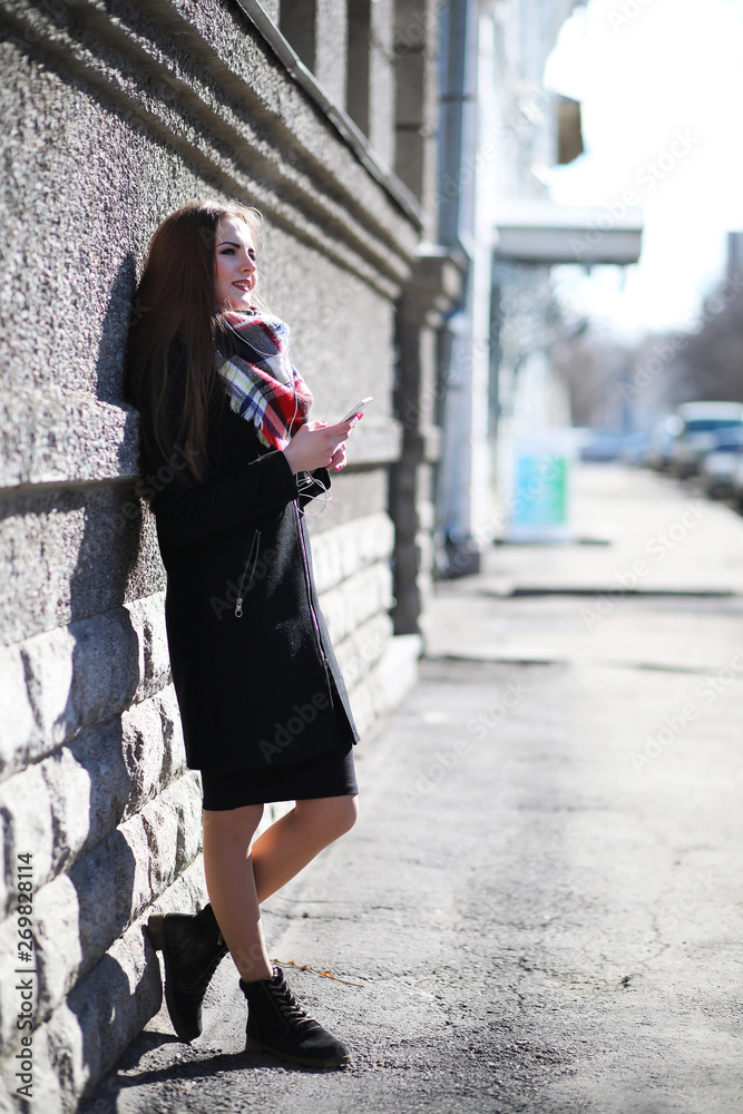 Obraz premium Girl on a walk in sunny weather