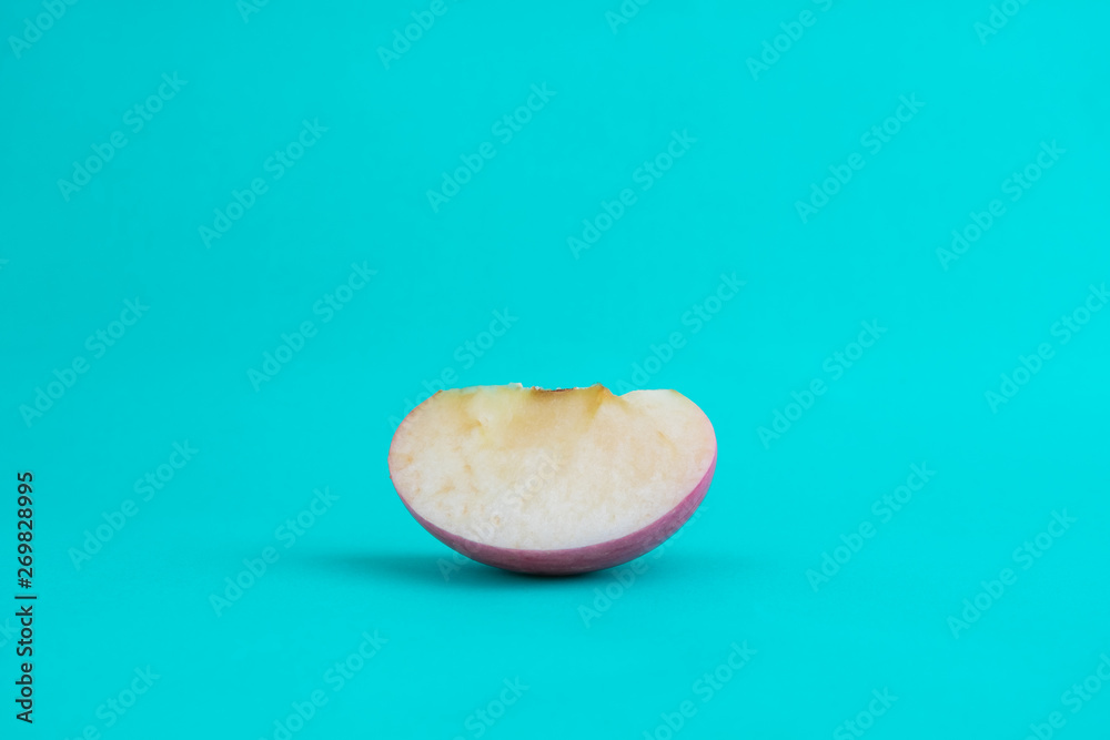 Red apple on colored background Red apple on colored background