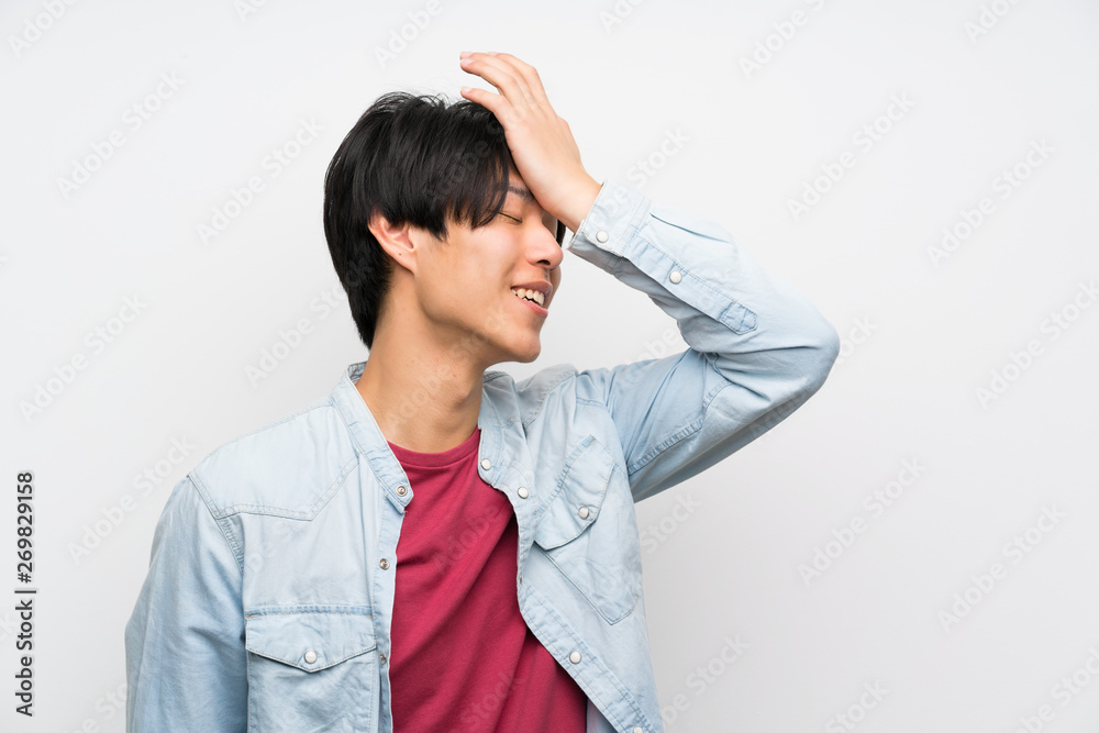 Asian man on isolated white background has realized something and intending the solution Asian man on isolated white background has realized something and intending the solution