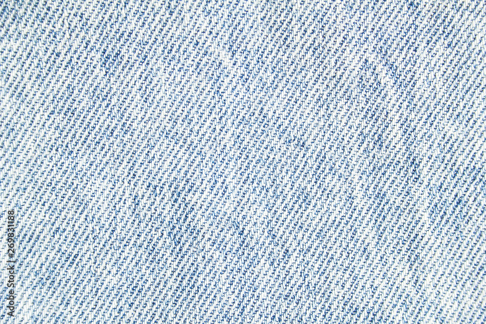 Foto Stock Closeup light blue jeans denim fabric texture background. |  Adobe Stock