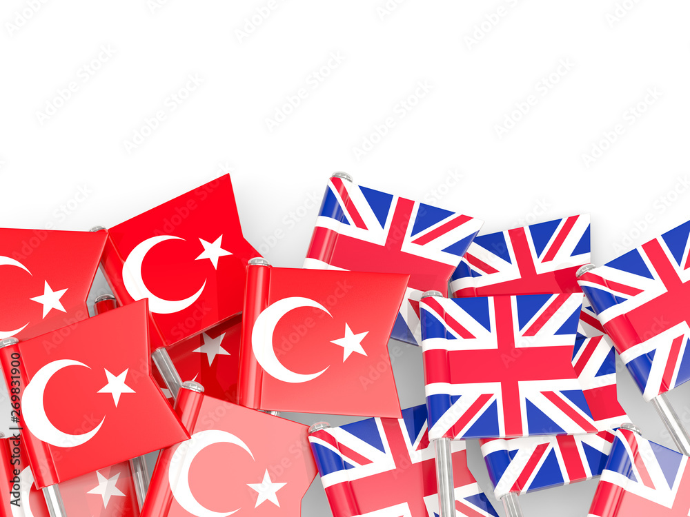 Obraz premium Pins with flags of Turkey and UK isolated on white.