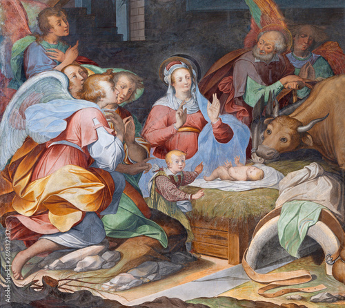 COMO, ITALY - MAY 8, 2015: The fresco of Nativity in church Basilica di San Fedele by unknown artist of 16. cent.