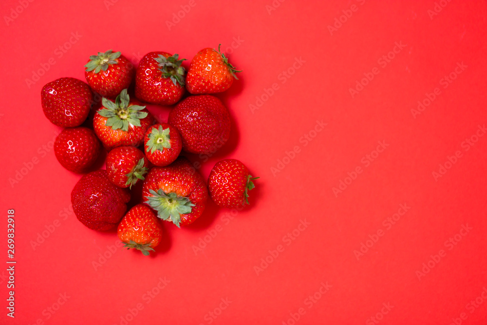 Strawberries on red background Strawberries on red background
