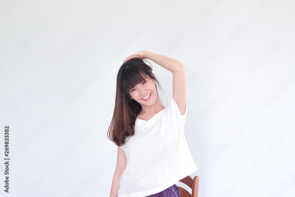 Fashion Portrait of Young asian woman smiling wearing natural fabric linen minimal clothing - copy space white background Fashion Portrait of Young asian woman smiling wearing natural fabric linen minimal clothing - copy space white background