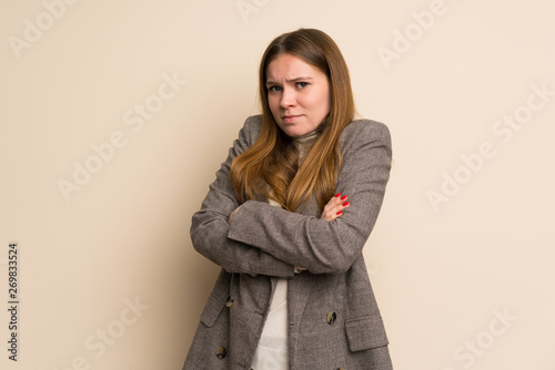 Young business woman making doubts gesture while lifting the shoulders © luismolinero