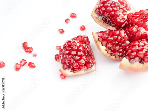 Red pomegranate fruit, isolated on a white background