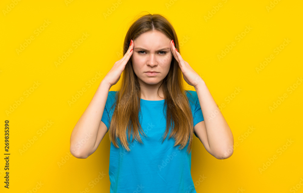 Young woman with blue shirt unhappy and frustrated with something. Negative facial expression Young woman with blue shirt unhappy and frustrated with something. Negative facial expression
