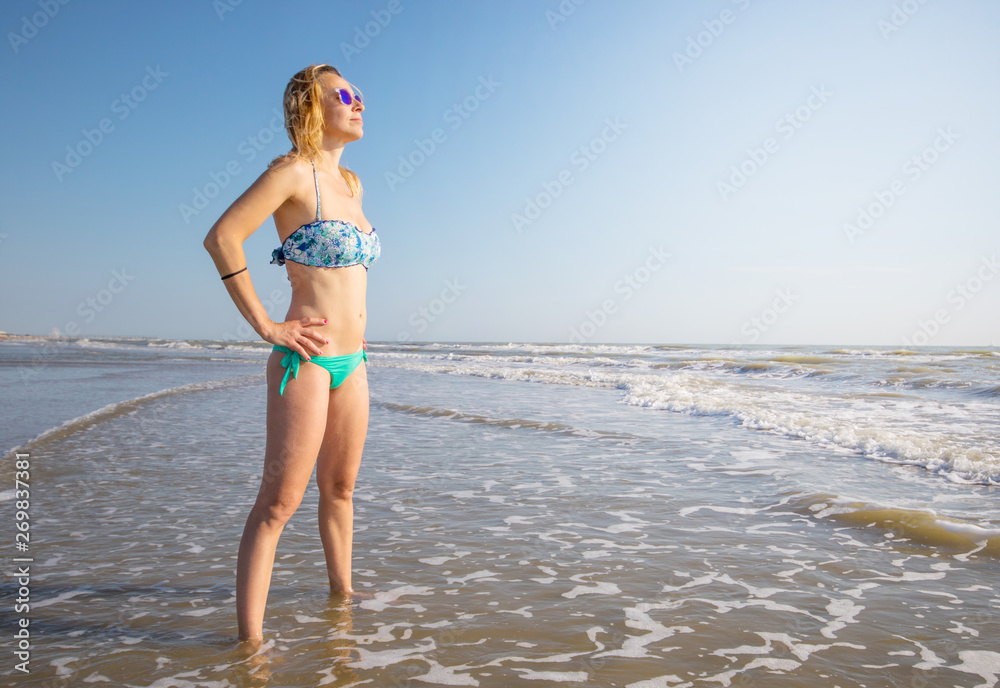 beautiful woman is taking the sun beautiful woman is taking the sun