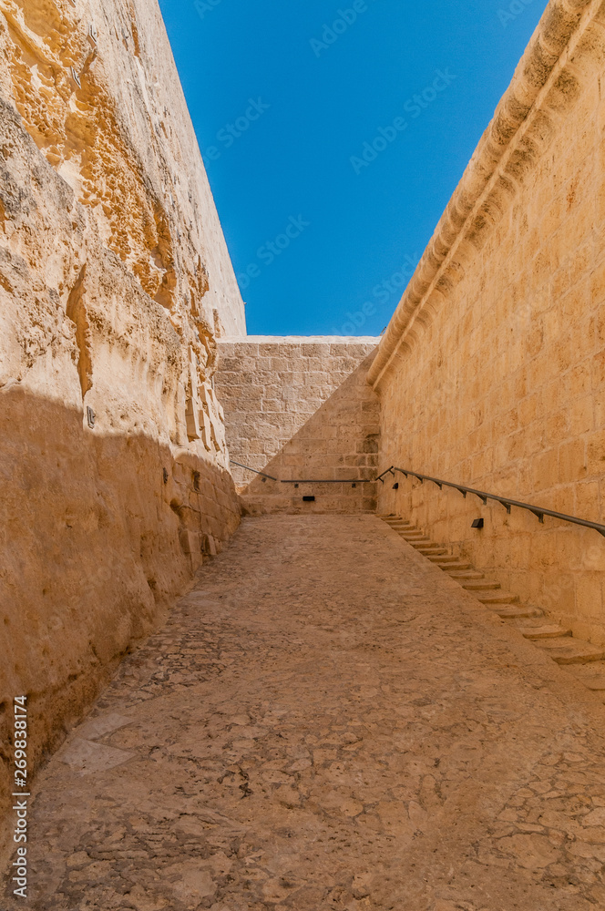 Narrow path and steps at Fort St. Angelo, Malta