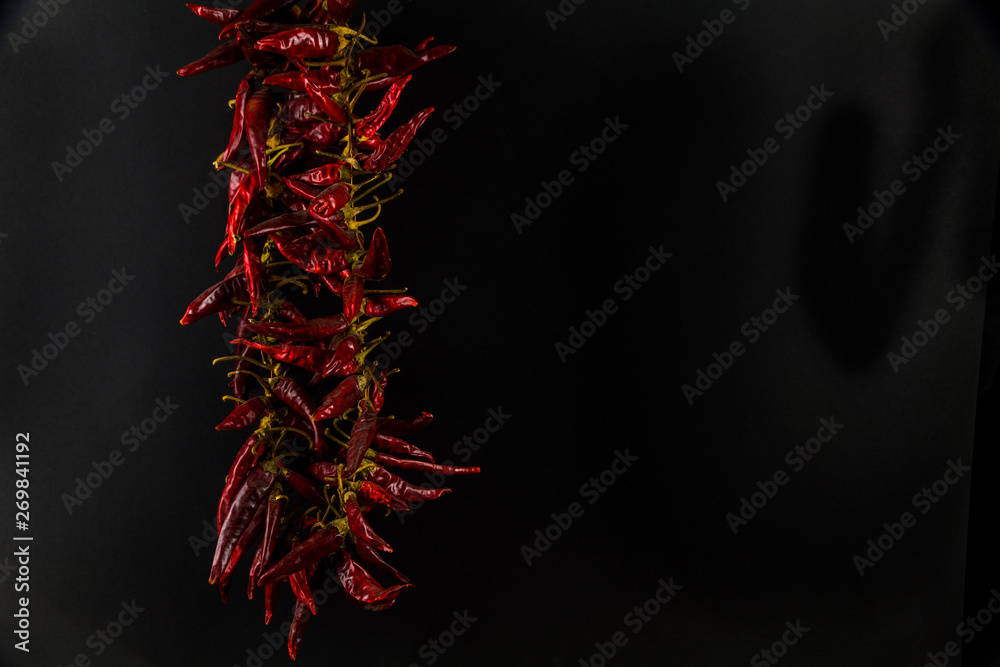 Pepper chilli string copyspace on right, landscape Pepper chilli string copyspace on right, landscape