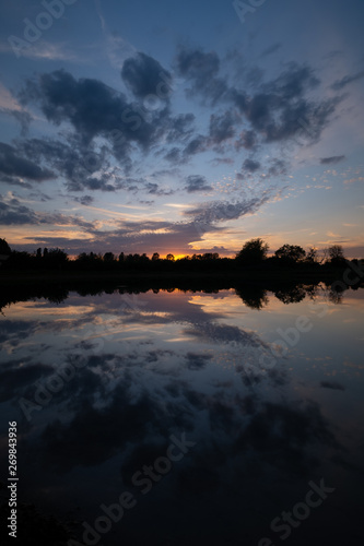 sunset over lake © Henry