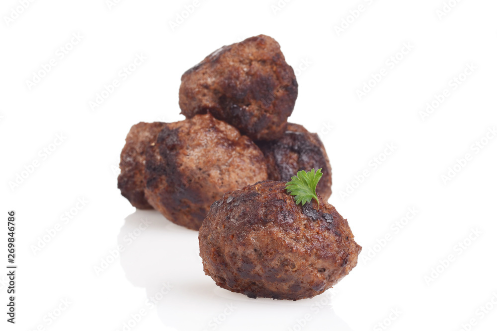 closeup homemade cooked meatball with parsley closeup homemade cooked meatball with parsley