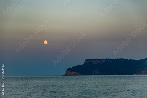 sunset at sea and moon