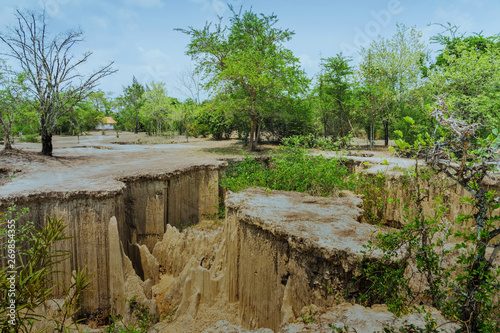 Beautiful Scenery of Water flows through the ground have erosion and collapse of the soil into a natural layer at Pong Yub, Ratchaburi,Thailand.