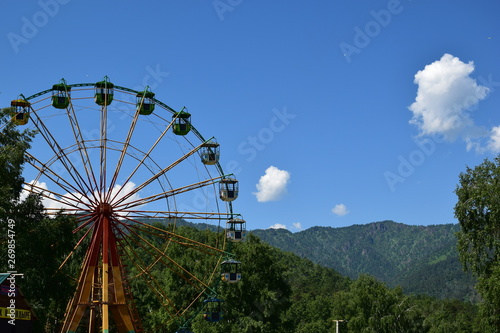 ferris wheel on blue sky