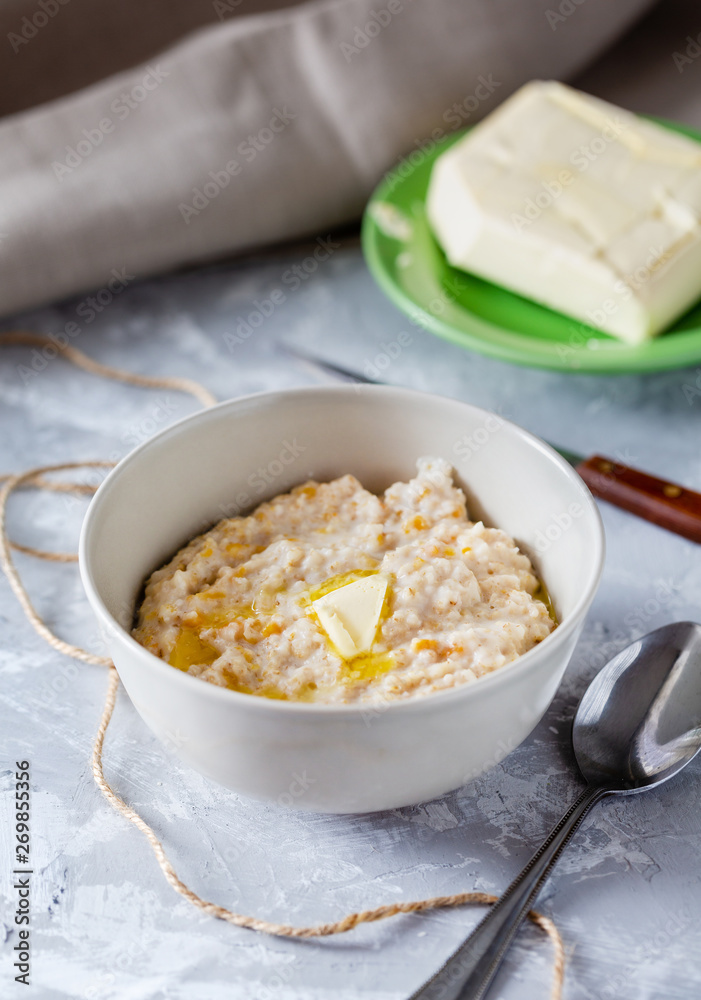 Oatmeal porridge with butter for breakfast Oatmeal porridge with butter for breakfast