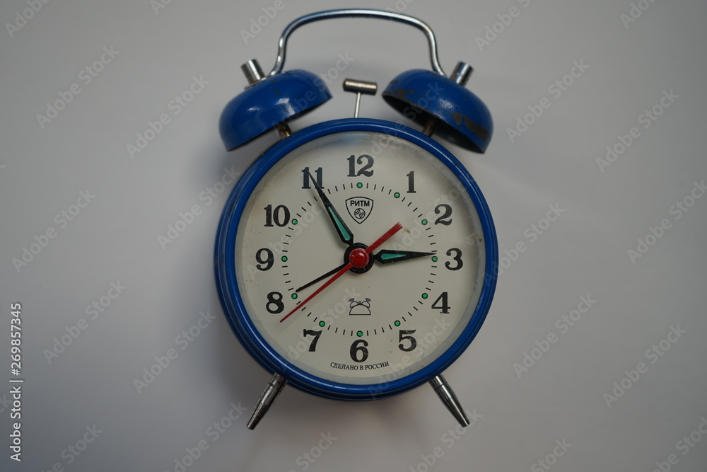 red alarm clock isolated on white background red alarm clock isolated on white background