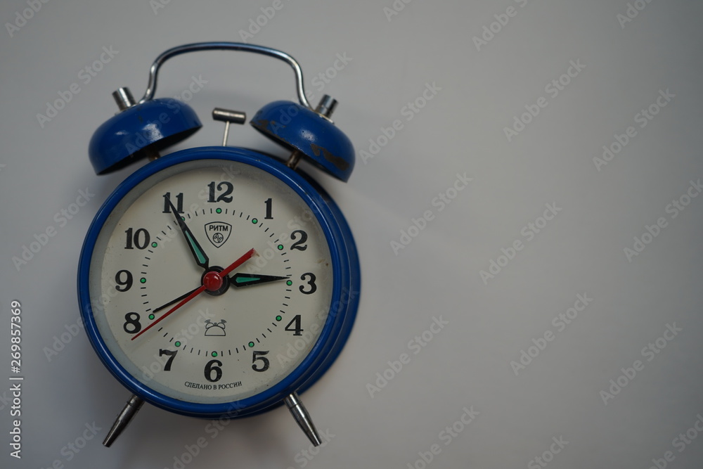 red alarm clock isolated on white background red alarm clock isolated on white background