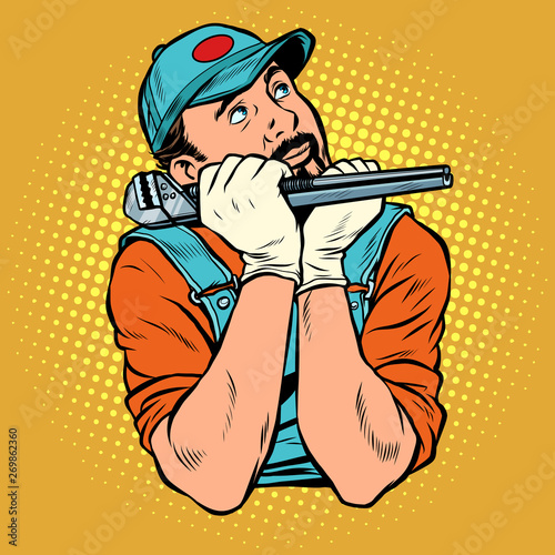 plumber with wrench dreamer thinks