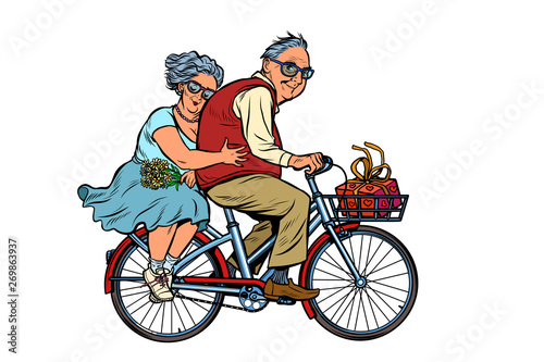 old man and woman couple in love, riding a bike