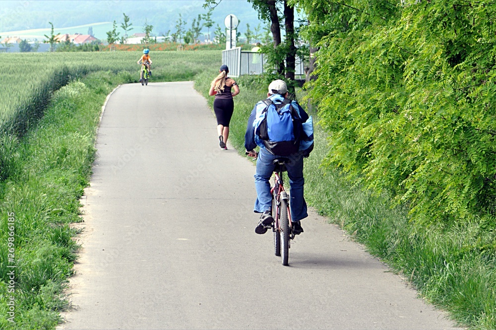 Obraz premium people and bike