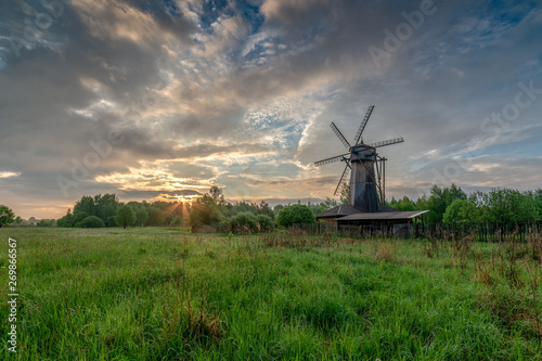 Windmill at dawn in spring